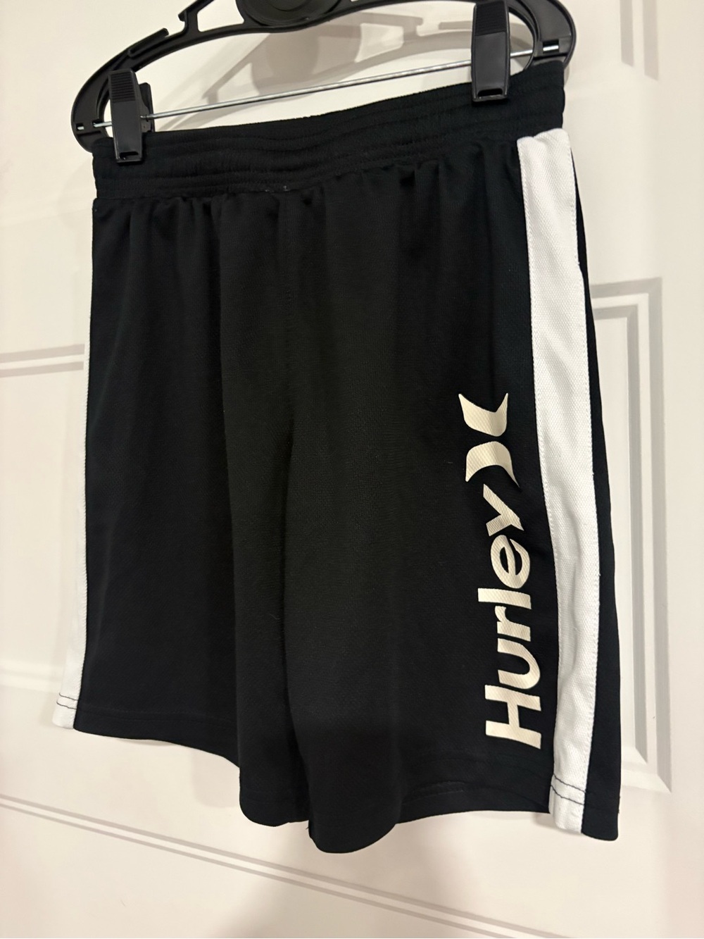 Hurley kid’s Black Shorts with White Side Stripes and Logo size Small